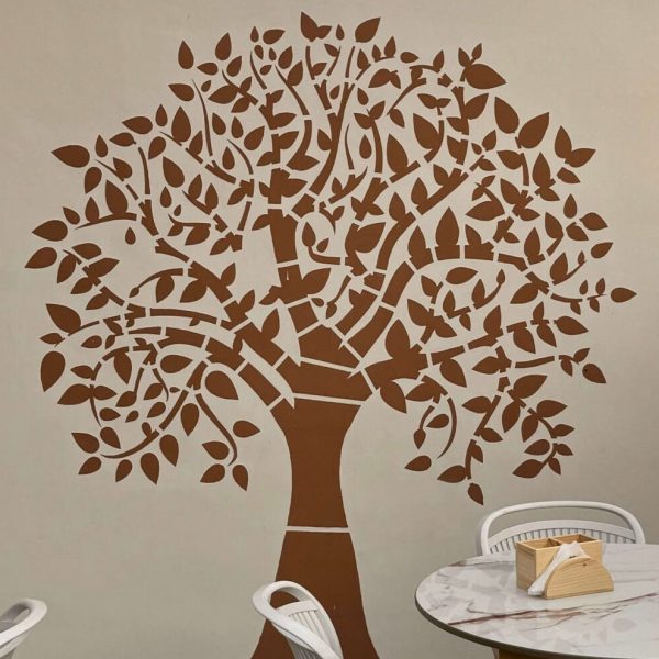 Comfortable seating space with modern decor and natural tones at Caffeine Tales