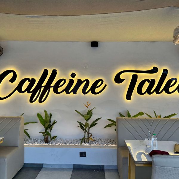 Bright and welcoming café ambience with spacious seating at Caffeine Tales